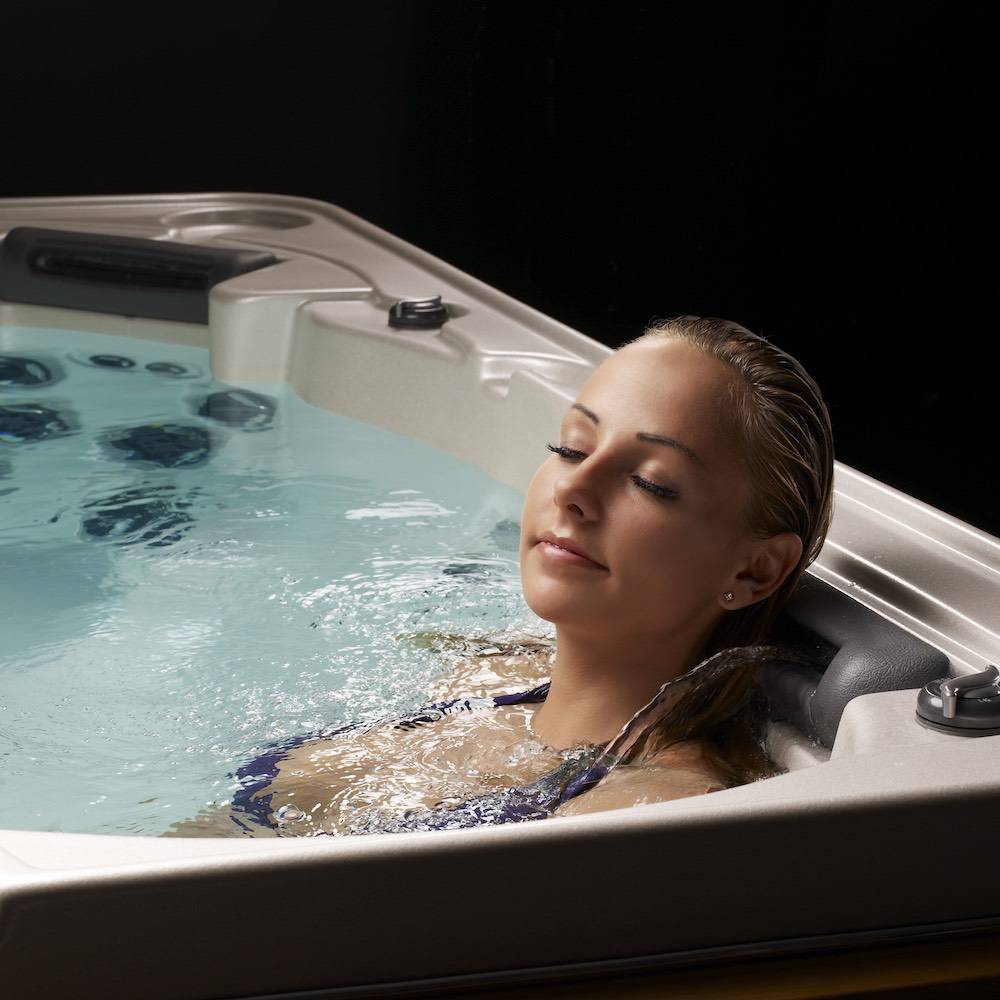 Brantford woman enjoying backyard hot tub